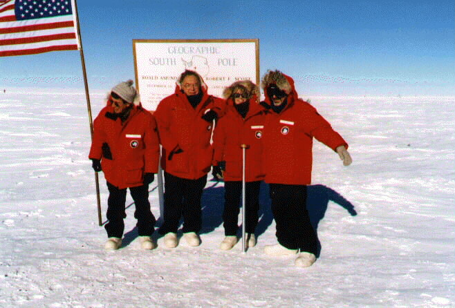 Dr. Neal Sullivan, Dr. Ed Feigenbaum, Ms. Julia Moore, and I pose near the marker indicating where the geographic south pole has been located this year. Because the ice is moving, its location relative to other landmarks keeps changing!